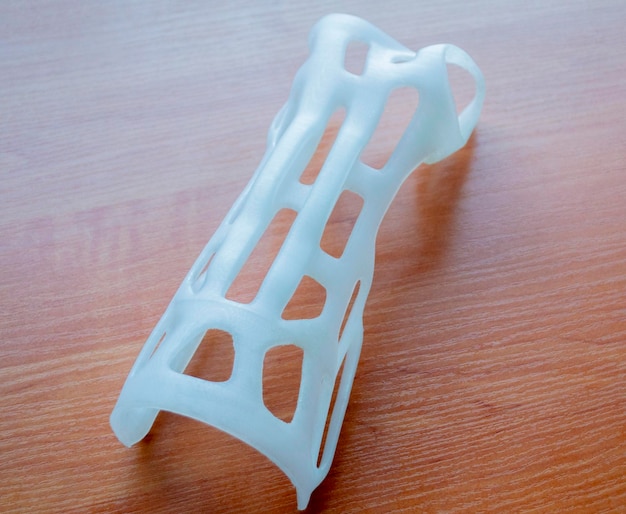 Hand arm splint corset prosthesis langet printed on a d printer from molten plastic medical orthosis