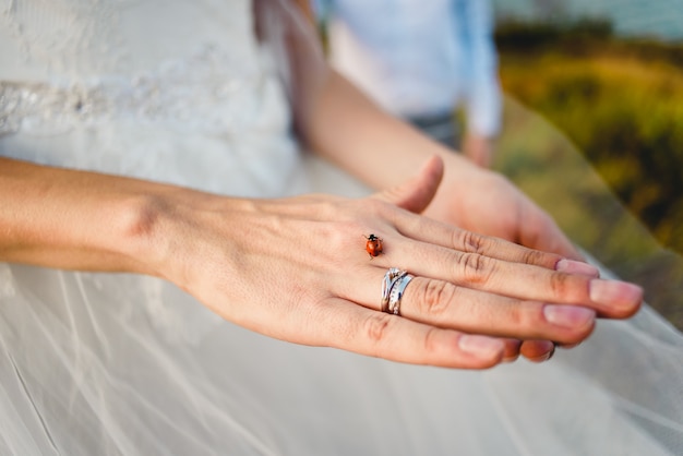 Hand of a bride with a ring