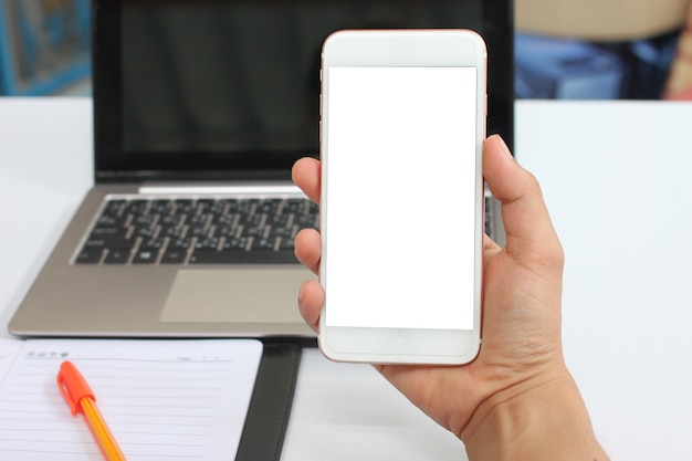 Photo hand of a businessman holding an empty smartphone.