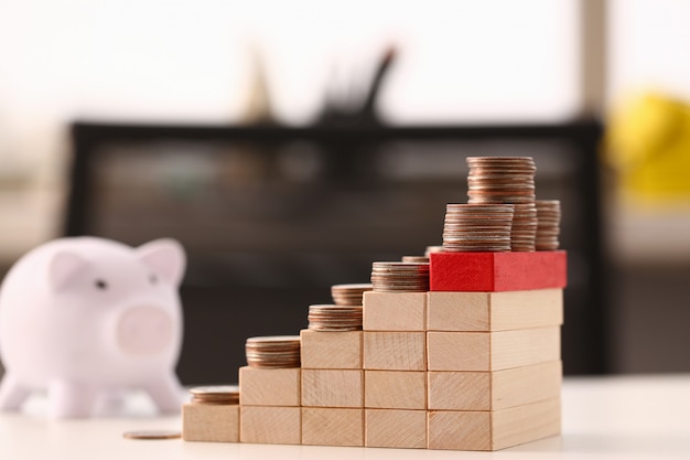 Hand businessman putting pin money