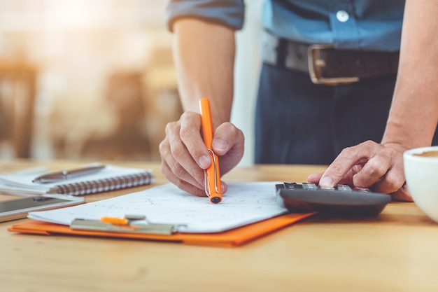 Hand businessman working with documents at office