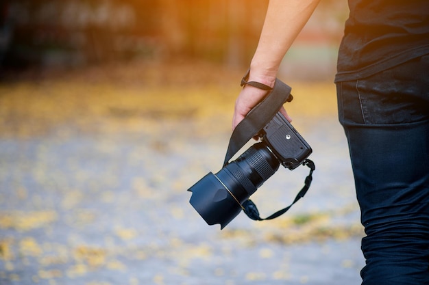 Hand and camera and travel