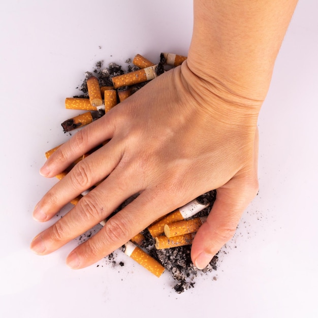 Hand cigarette white stop pile