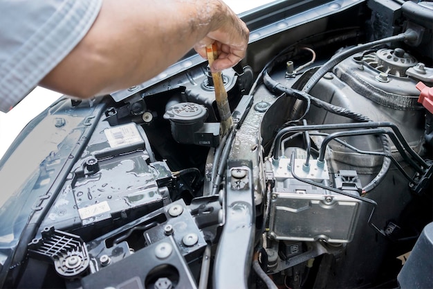 Photo hand cleaning car machine with a brush