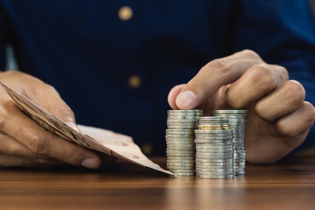 Hand counting money coins stack business finance