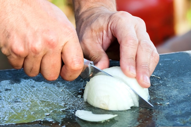 Hand cut the onion halfrings