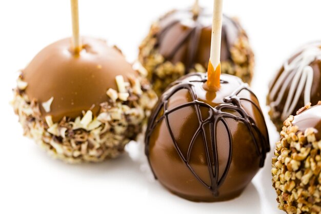 Hand dipped caramel apples decorated for Halloween.