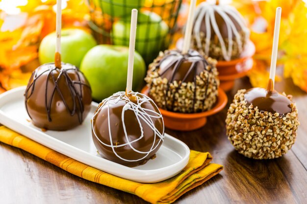 Hand dipped caramel apples decorated for halloween