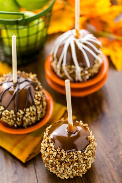 Hand dipped caramel apples decorated for Halloween.