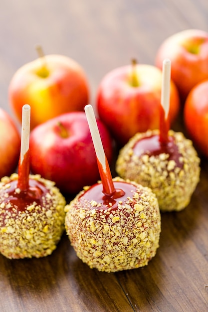 Photo hand dipped caramel apples decorated for halloween.