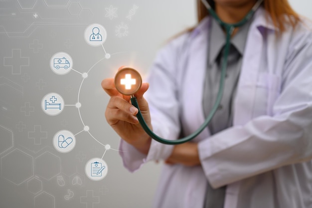 hand of a doctor a stethoscope with modern medical icons health insurance concept
