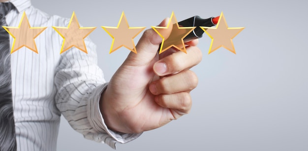 Hand draw five star rating evaluation and review concepts