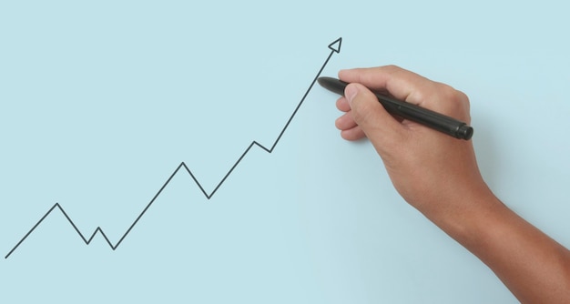 Hand drawing a chart, graph stock of growth