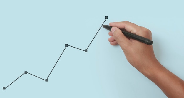 Hand drawing a chart, graph stock of growth