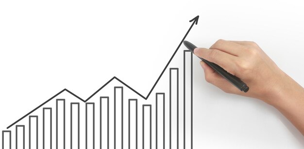 Hand drawing a chart graph stock of growth
