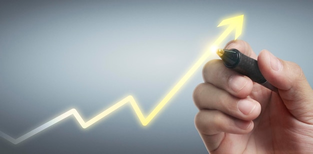 Hand drawing a chart graph stock of growth