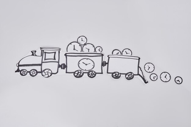 Photo hand drawn train full of clocks on white background lots of time concept