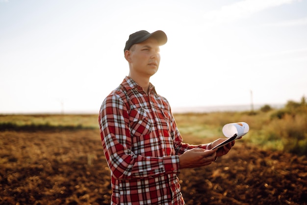 Hand of expert farmer collect soil and checking soil health before growth a seed of vegetable