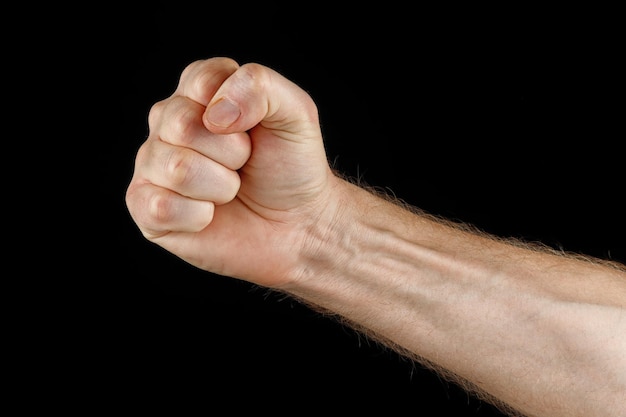 Photo hand and fist as a symbol of protest