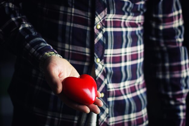 Hand give valentine heart