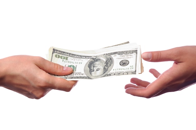 hand giving money to another hand