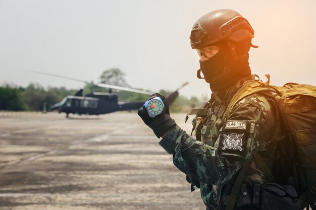 Hand in glove with the parachutist altimeter close up.