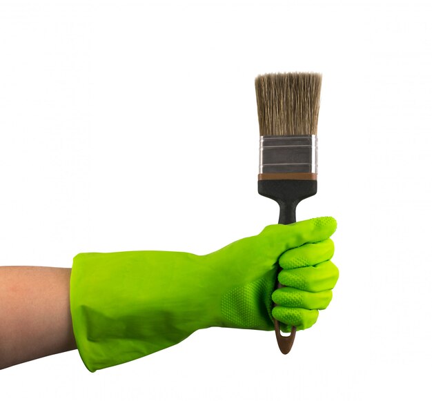 Hand in green protective rubber glove 