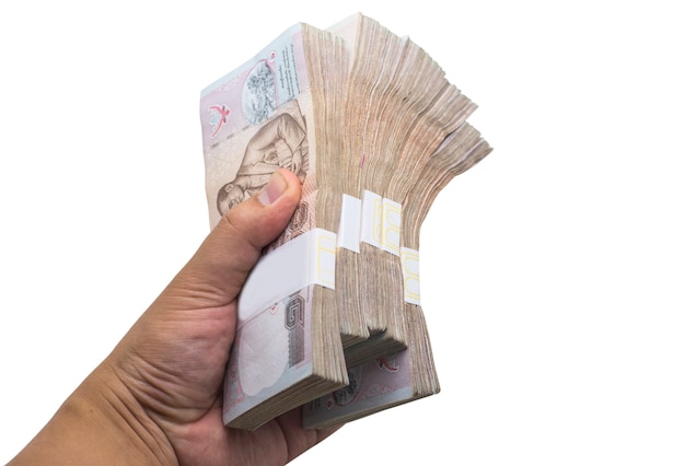 hand hold big lot money on white isolated background (onclude path)