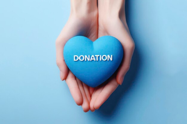 Фото Рука держит голубое сердце с пожертвованием слово ai генератив