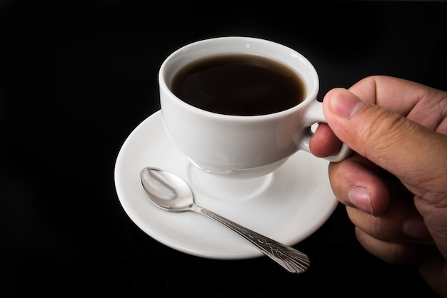 Hand hold cup of coffee