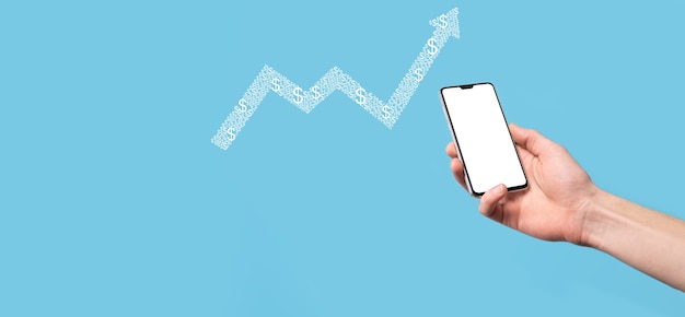 Hand hold drawing on screen growing graph, arrow of positive growth icon.pointing at creative business chart with upward arrows.Financial, business growth concept.