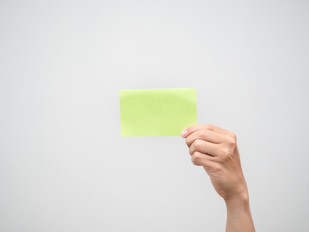 Hand hold post it white isolated