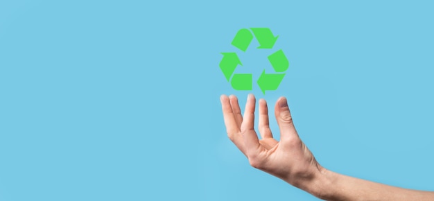 Hand hold recycling icon.ecology and renewable energy concept.eco sign, concept save green planet. symbol of environmental protection.recycling waste.symbol of earth day, concept of nature protection.