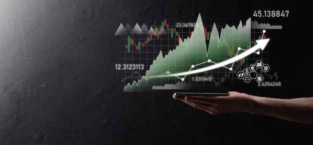 Hand hold sales data and economic growth graph chart. Business planning and strategy. Analysing trading of exchange. Financial and banking. Technology digital marketing.Profit and growing plan.