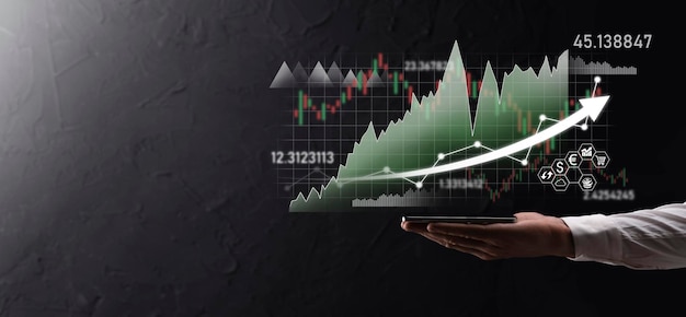 Hand hold sales data and economic growth graph chart. Business planning and strategy. Analysing trading of exchange. Financial and banking. Technology digital marketing.Profit and growing plan.