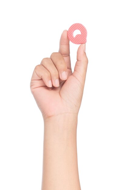 Photo hand holding alphabet made from eva foam isolated on white background