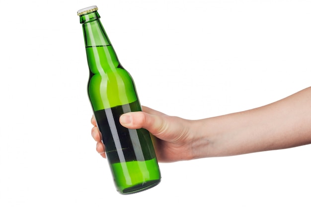 Hand holding a beer bottle without label isolated on white 