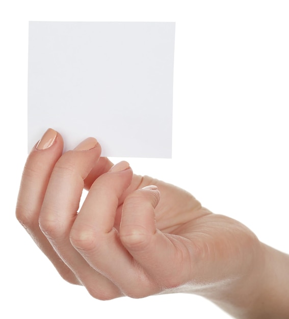 Hand holding blank card isolated on white