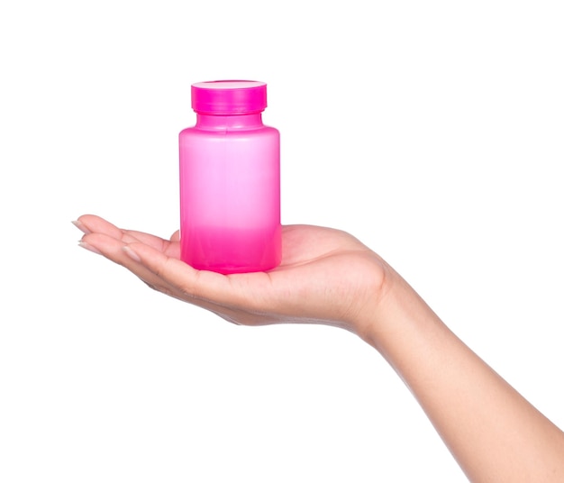 hand holding Blank medicine bottle isolated on white background