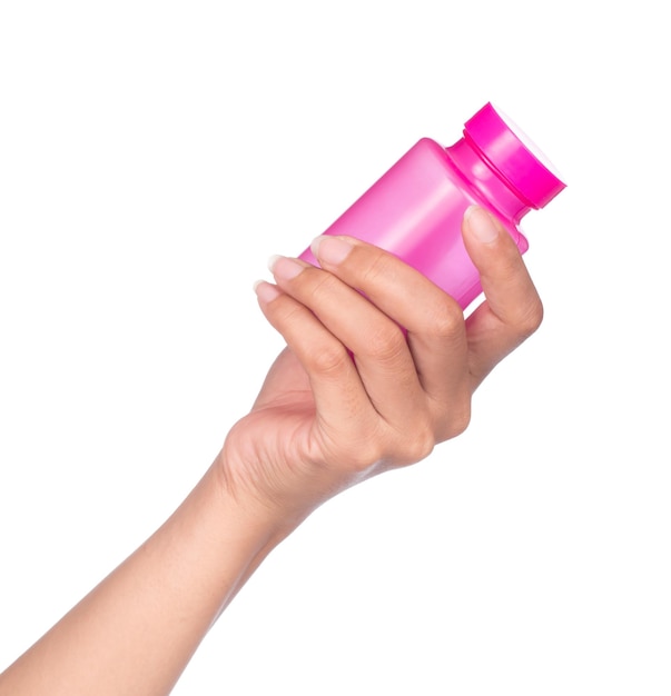 hand holding Blank medicine bottle isolated on white background