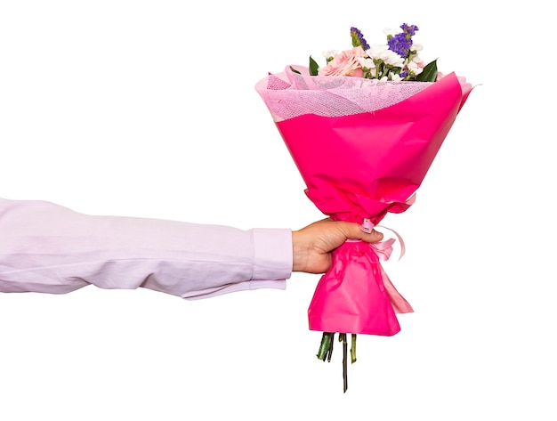 Hand holding bunch of roses isolated against white background. Beautiful pink bouquet close-up in a man's hand.