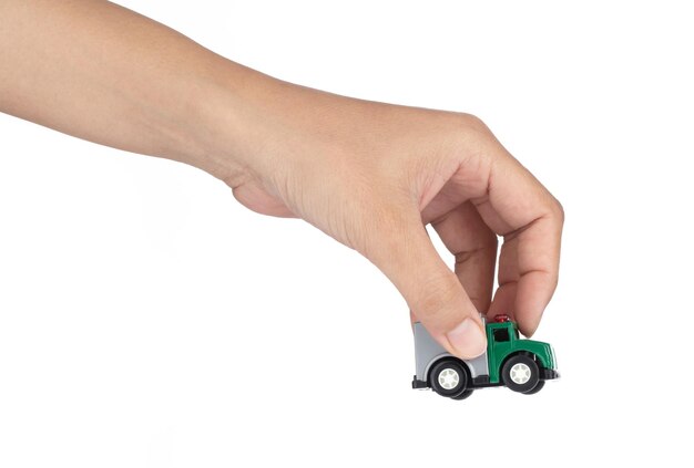 Hand holding car toys isolated on a white background