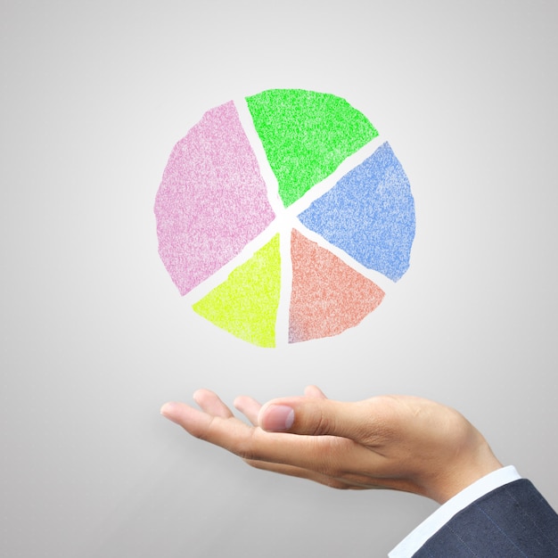 Photo hand holding circle chart