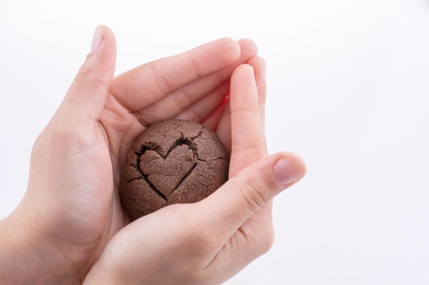 Hand holding a cookie