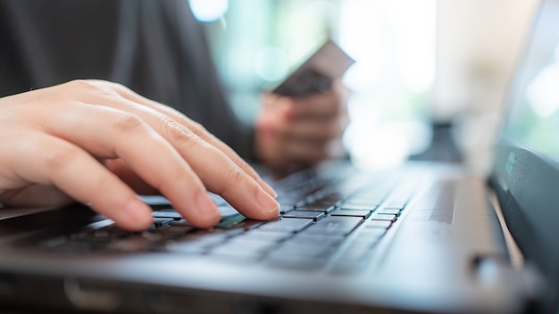 Hand Holding A Credit Card For E-Commerce