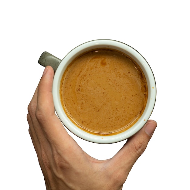 A hand holding a cup of coffee