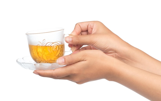 hand holding a cup of tea isolated on white background