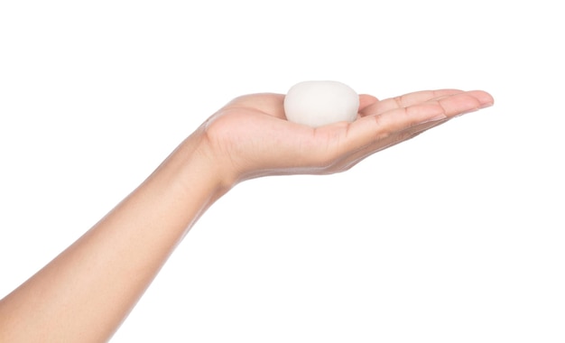 Photo hand holding daifuku cake isolated on white background