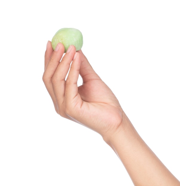 hand holding Daifuku cake isolated on white background