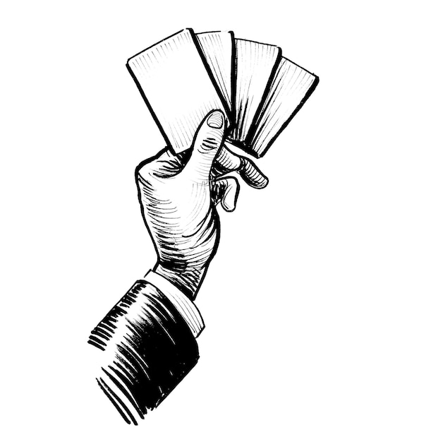 A hand holding a deck of cards